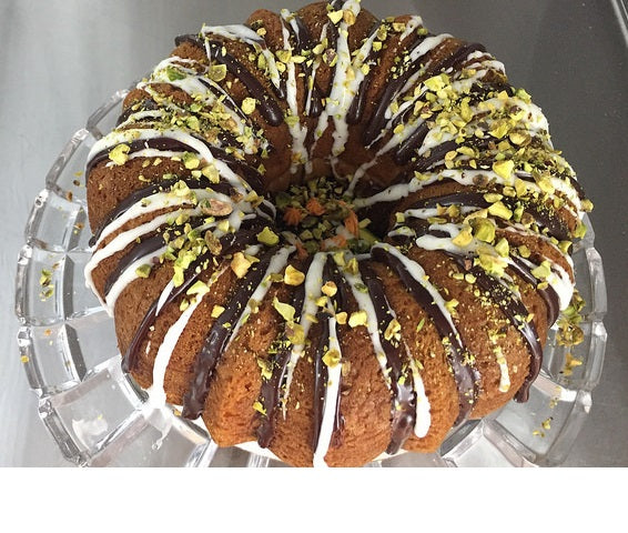 http://ventitobakery.com/cdn/shop/products/Bundt-Cake-with-ChocolateGanache-and-White-Drizzle_1200x1200.jpg?v=1600864887