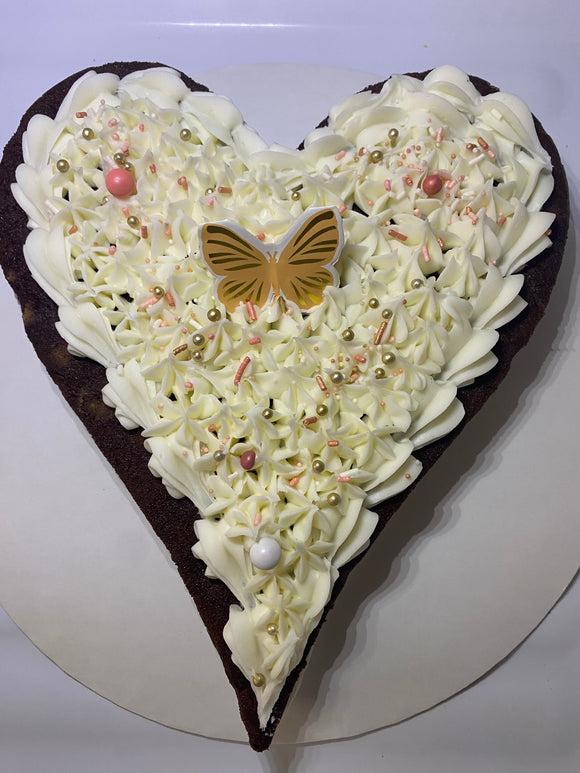 Heart shaped madagascar vanilla cake with peanut butter